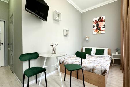 Уютная студия с большой кроватью