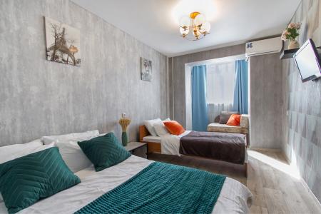 Просторная двухкомнатная студия с размещением до 7 человек