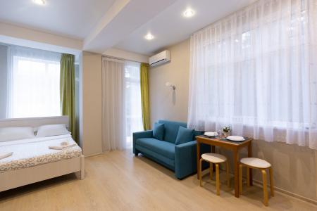 Однокомнатные Апартаменты с балконом в 10 минутах пешком до моря