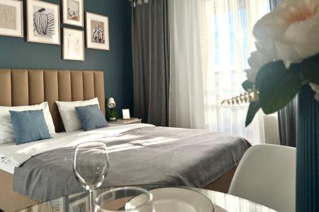 Уютнaя студия в сoвpемeнном квартале у пaркa и заливa