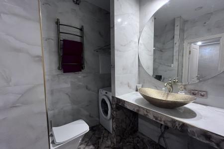 Двухуровневая квартира в светском пригороде.