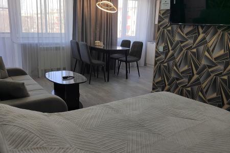 Уютная квартира-студия Люкс с Умным домом в центре города