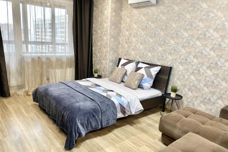 Четырехместная студия с панорамным видом на город с 21 этажа