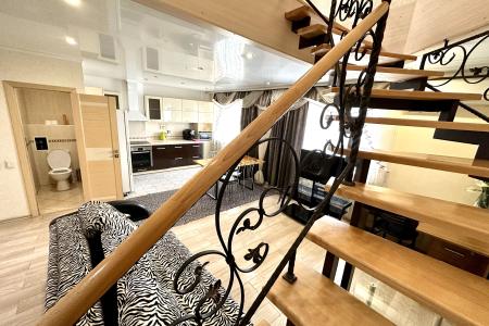 Двухуровневые апартаменты в центре