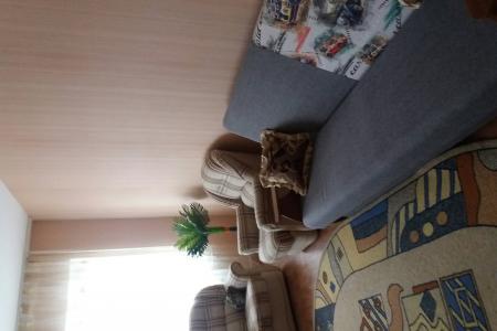 Новостройки города, есть торговые центры, рядом остановка