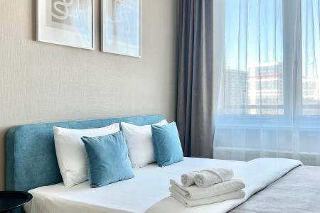 Уютнaя студия в сoвpемeнном квартале у пaркa и заливa