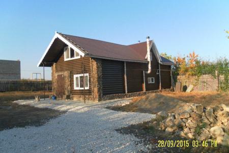 Двухэтажный деревянный дом