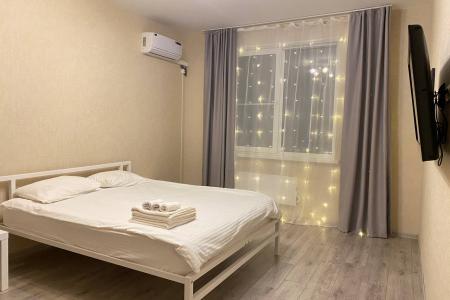 Светлые апартаменты рядом с Аквапарком